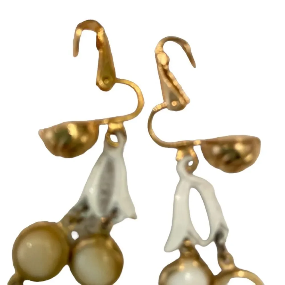 New Vintage 1990’s soft clip on drop earrings gold tone swirl & white enamel